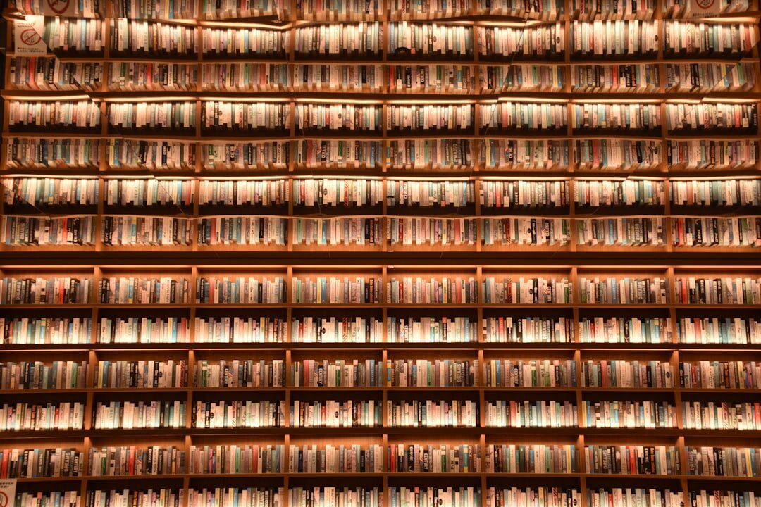 Shelves filled with old VHS tapes and film reels in an archive